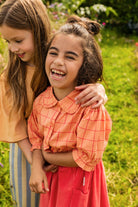 Meisje met een Sproet & Sprout Terry Skirt Pockets rokje