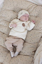Baby met Feetje Sokken Cute Cookie in Offwhite Melange gemaakt van 85% katoen 13% polyamide en 2% elastaan met een schattige koekjes print voor kinderen ideaal voor dagelijks gebruik